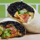 Close-up of black bean burrito
